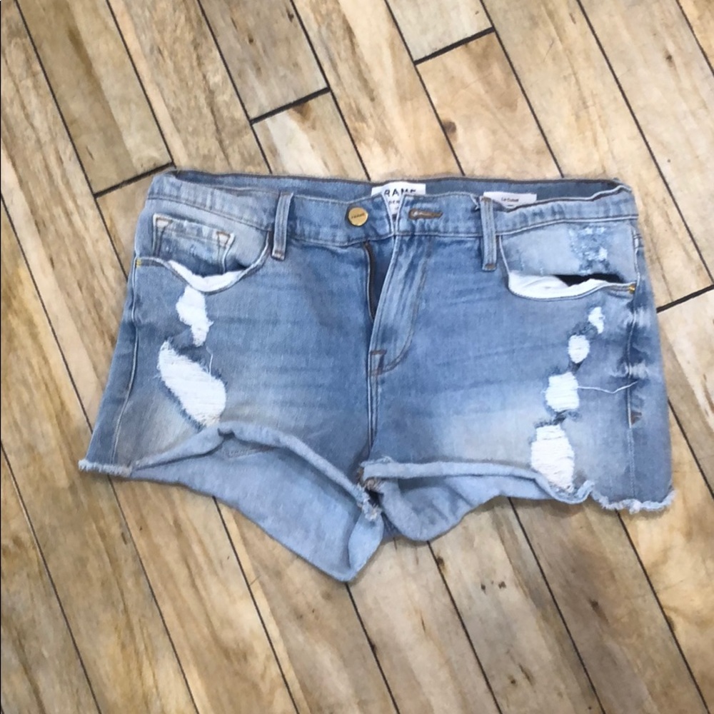 Like new. Frame cut off shorts. 29. Distressed